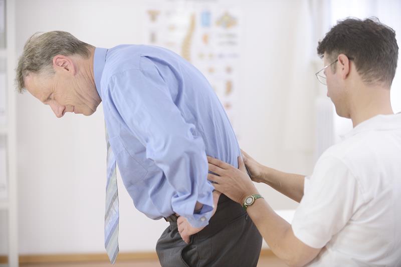 Gonstead chiropractor adjusting patient in La Jolla