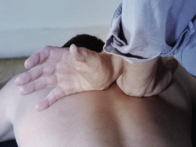 Gonstead chiropractor adjusting patient in San Marcos