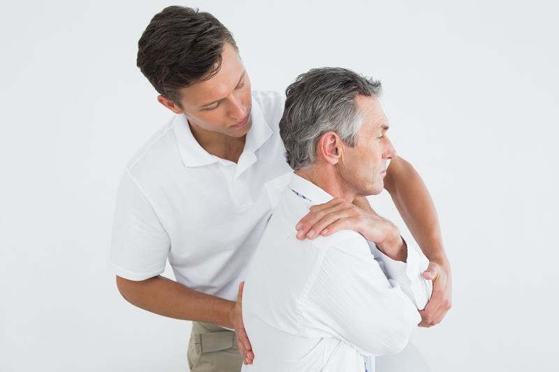 Gonstead chiropractor adjusting spine in Chula Vista clinic