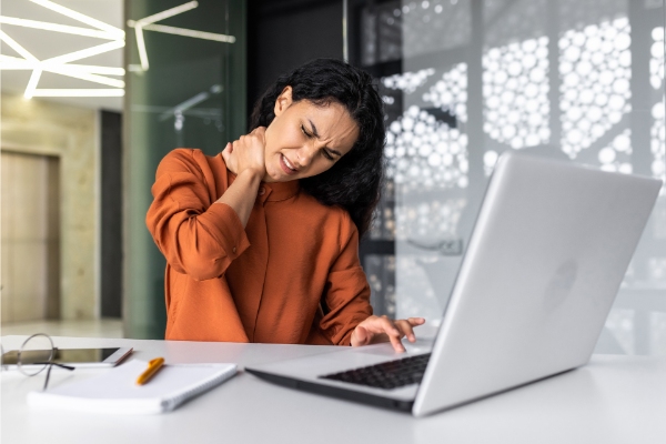 Office worker exhibiting forward head posture