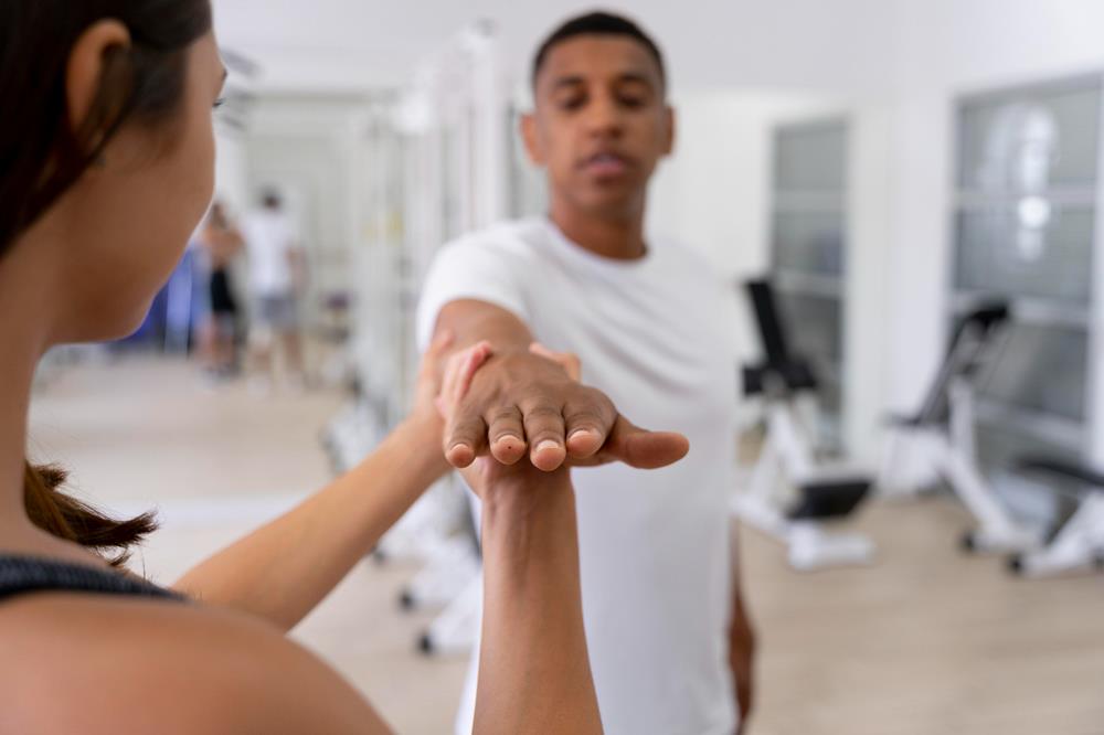 Patient performing balance exercise during functional screen