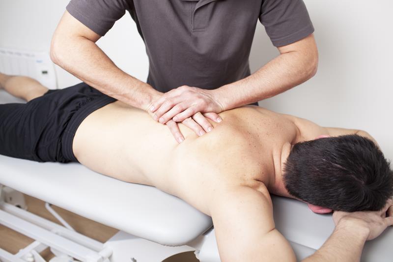 San Diego chiropractor performing Gonstead spinal adjustment