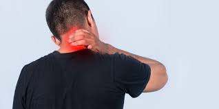Person holding neck in pain